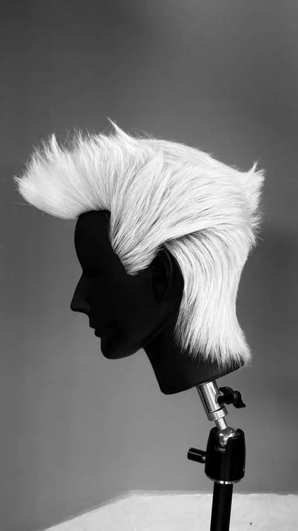 Platinum mohawk-style cut on a mannequin head